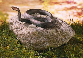 Sculpture de jardin "Serpent", cuivre sur pierre